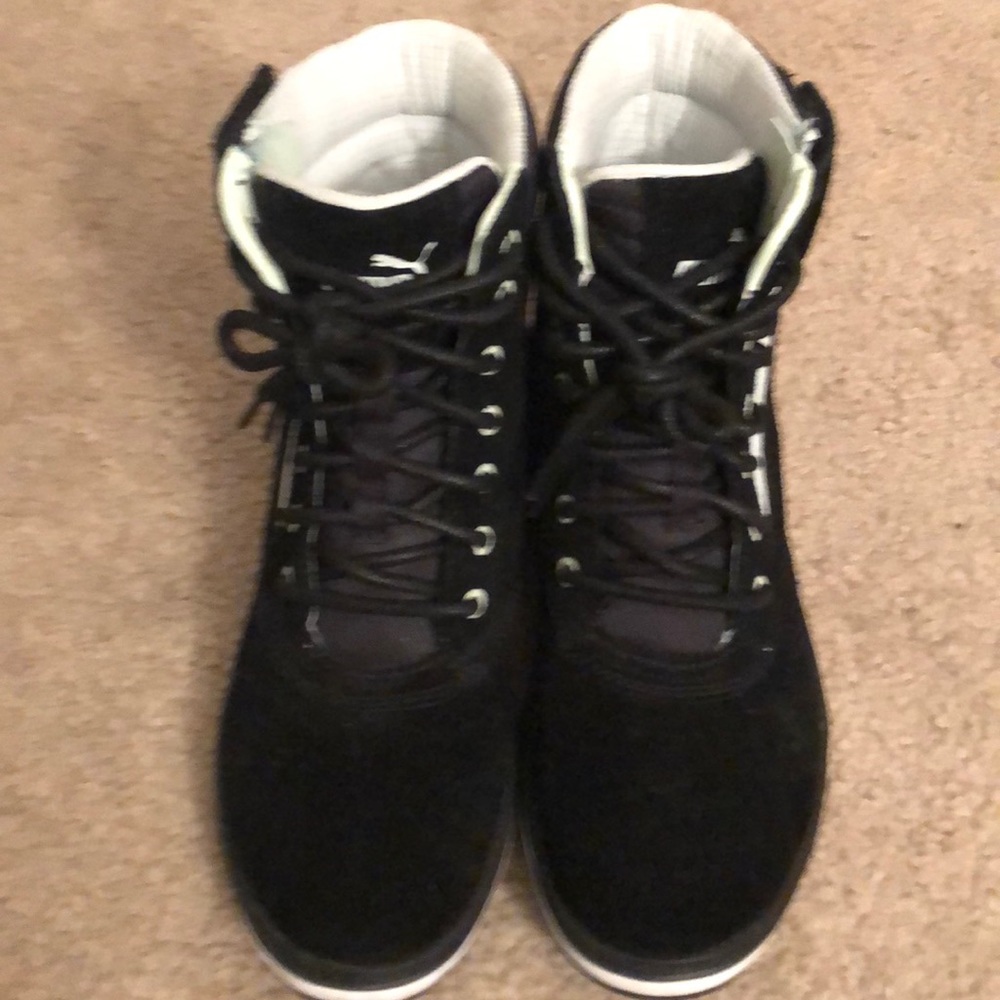 Black high top Puma sneakers